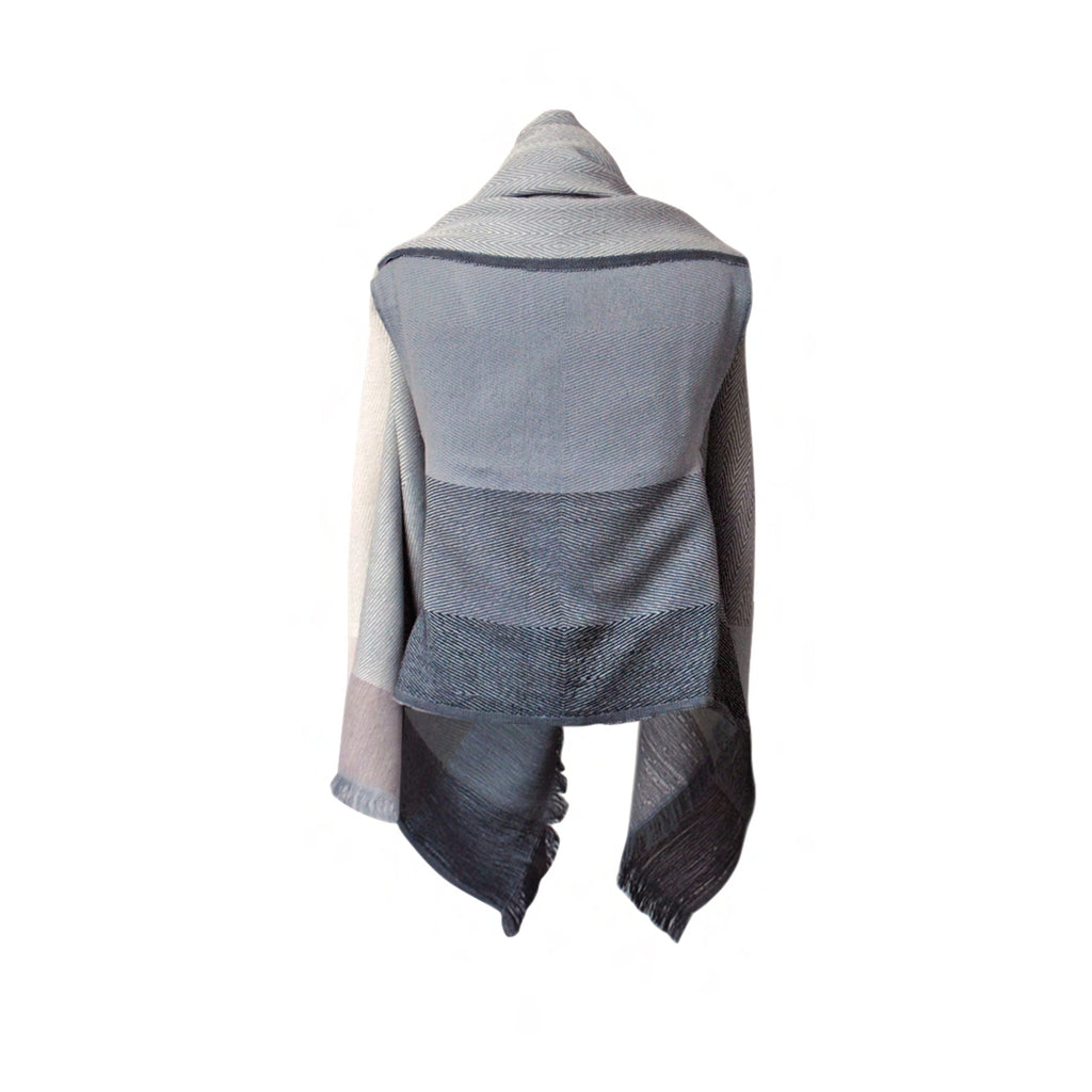 Sustainable wool capes by JULAHAS in classic neutral colours