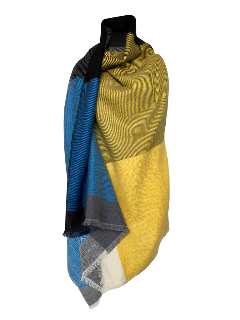 Limited Edition JULAHAS Cape inspired by the colours of the Ukrainian flag and is a show of our solidarity with the people of Ukraine
