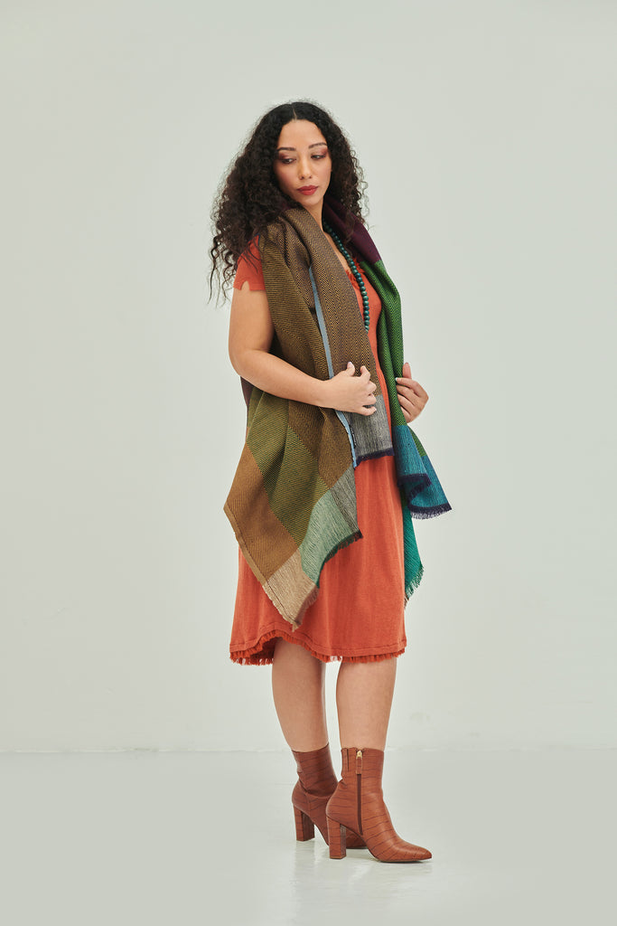 One size fits all, sustainable poncho cape in warm tones Daria Cape Madeira 
