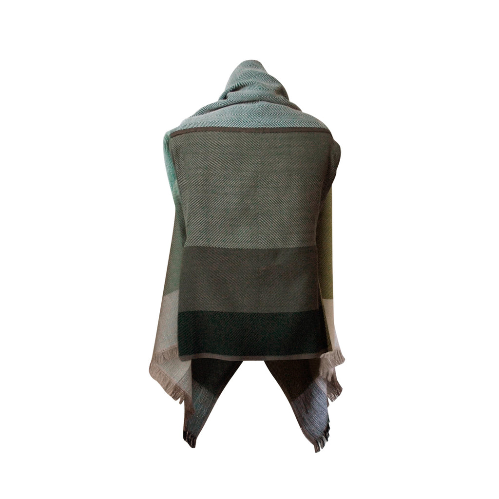 sustainable wool cape by julahas in the colour classic green