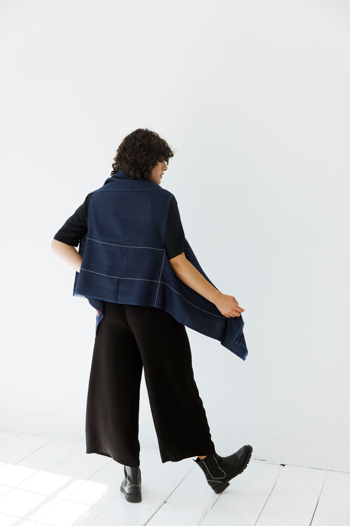 Navy and black minimal wool cape for travel and work