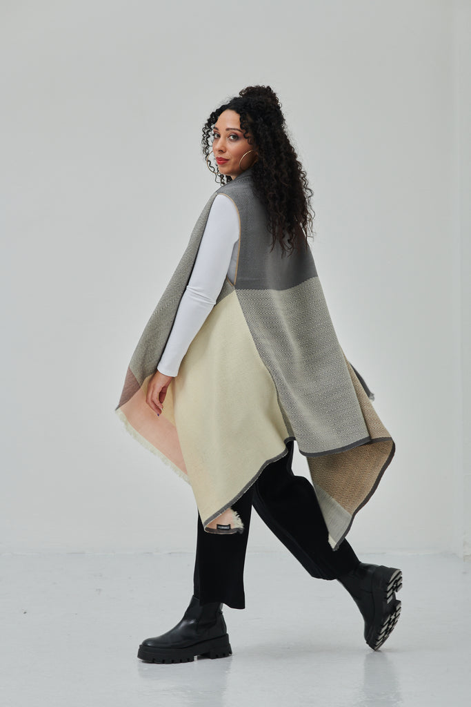Julahas luxury women's poncho cape in pure wool to be styled in 15-in-one ways and perfect as a warm sylish sustainable clothing item for layering