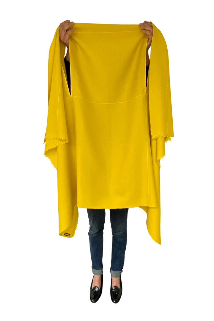 Stylish and sustainable wool cape in yellow for women made by julahas