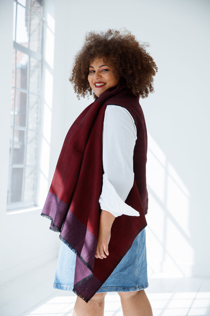 Shop handmade, versatile and sustainable wool cape by julahas in shades of stylish red