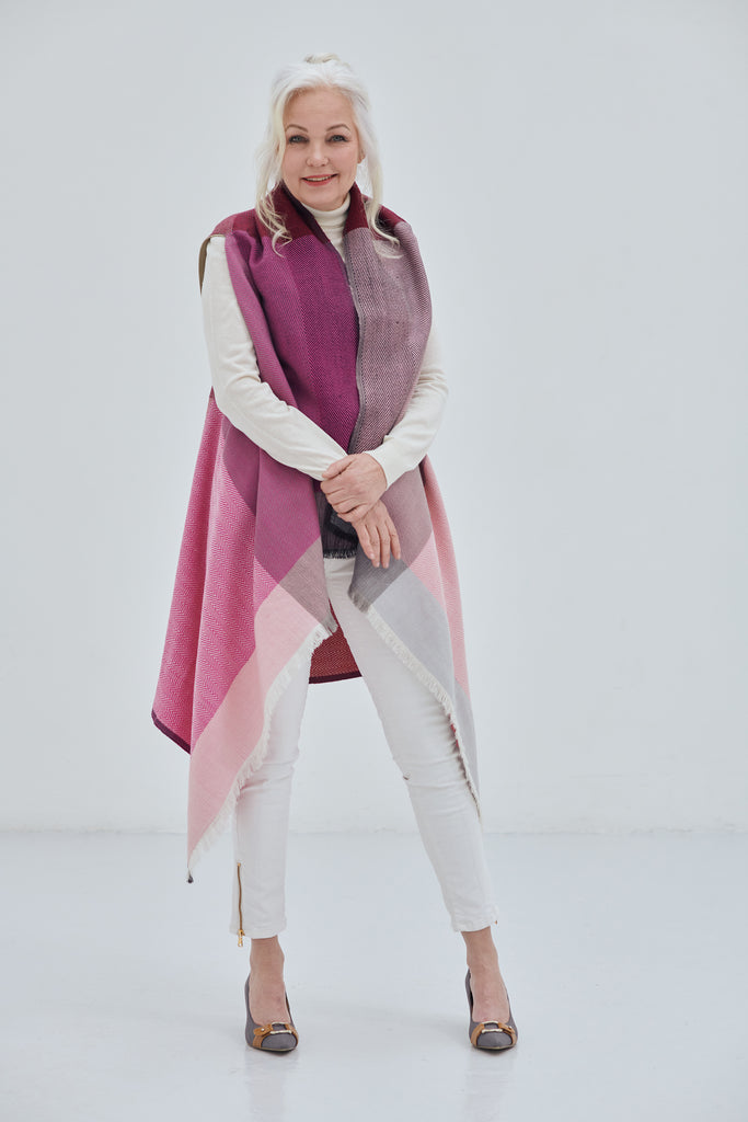 A pure wool versatile Poncho Cape Ishikari in bright shades of Pink
