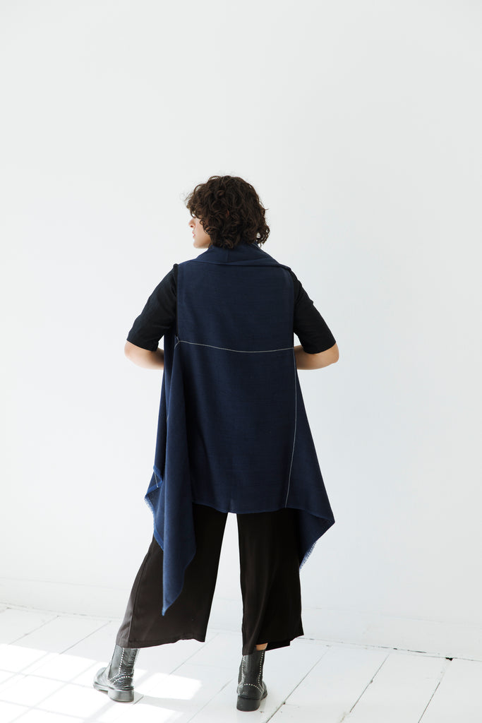 Navy and black minimal wool cape for travel and work
